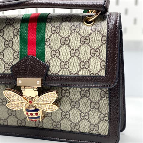 gucci bag bee clasp|Gucci bee bag price.